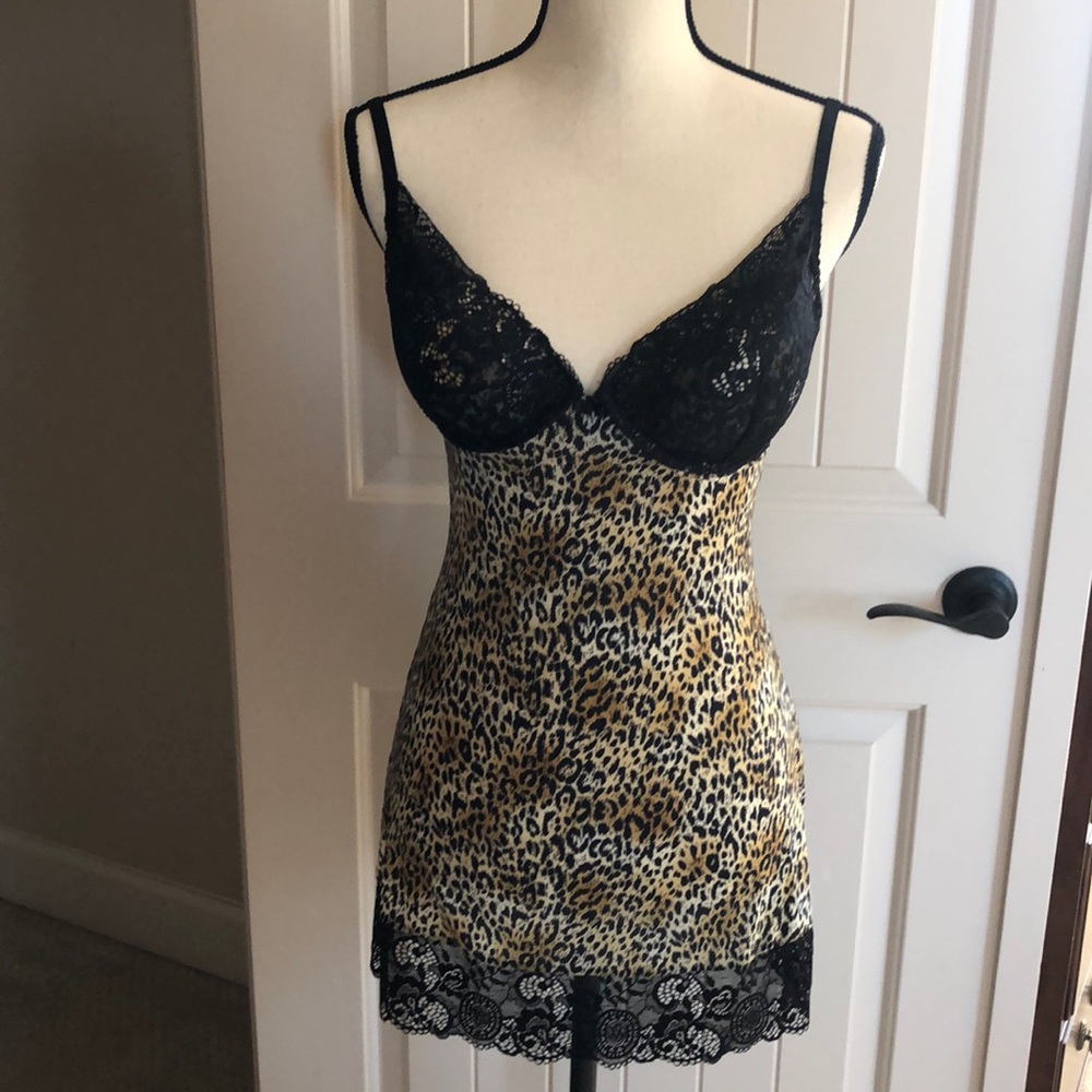 Victoria’s Secret romper Sz 34 D in black lace and leopard design. Silky fabric